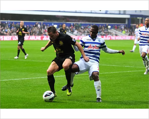 Battle for the Ball: Jagielka vs Hoilett in Everton's Draw with Queens Park Rangers (BPL 2012)