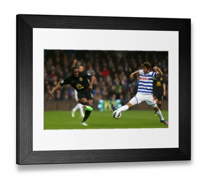 Framed Print : Anichebe vs. Granero: A Battle at Loftus Road - Everton vs. Queens Park Rangers Premier League Draw