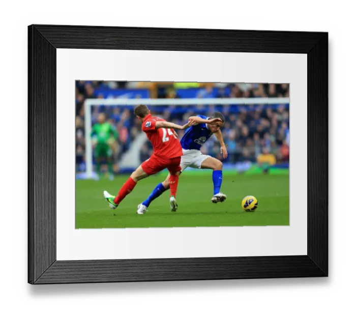 Framed Print : Battle at Goodison Park: A Riveting Tie Between Allen and Osman (Everton vs. Liverpool, Barclays Premier League)