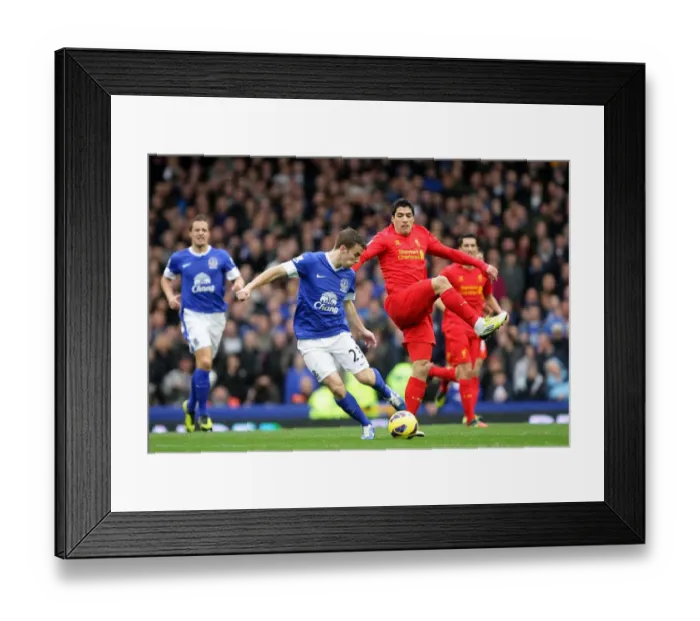 Framed Print : Clash at Goodison Park: Suarez vs. Coleman - Everton vs. Liverpool (28-10-2012) - A Battle for Supremacy Framed Print : Clash at Goodison Park: Suarez vs. Coleman - Everton vs. Liverpool (28-10-2012) - A Battle for Supremacy