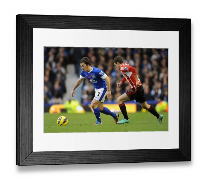 Framed Print : Clash at Goodison Park: A Battle Between Leighton Baines and Adam Johnson Framed Print : Clash at Goodison Park: A Battle Between Leighton Baines and Adam Johnson