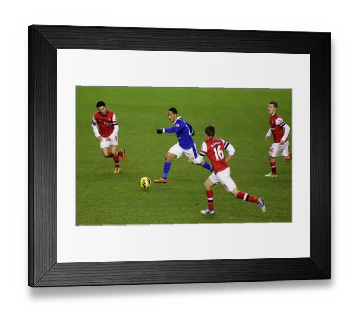 Framed Print : Steven Pienaar Charges Forward: Everton vs. Arsenal - Barclays Premier League Rivalry (1-1) Framed Print : Steven Pienaar Charges Forward: Everton vs. Arsenal - Barclays Premier League Rivalry (1-1)