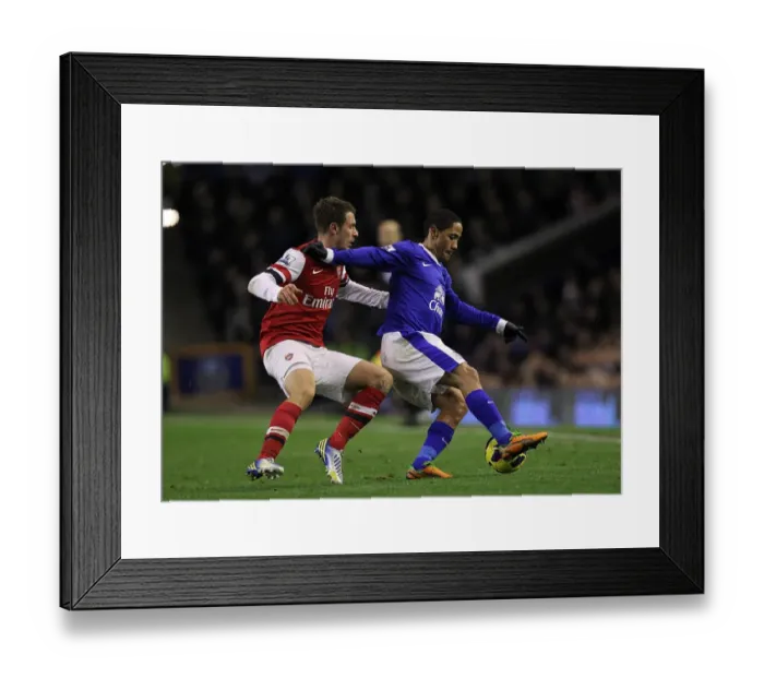 Framed Print : Battle for the Ball: Pienaar vs. Ramsey - Everton vs. Arsenal Rivalry in the Premier League Framed Print : Battle for the Ball: Pienaar vs. Ramsey - Everton vs. Arsenal Rivalry in the Premier League