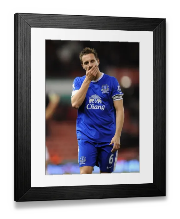 Framed Print : Phil Jagielka's Determined Face-off Against Stoke City in the Barclays Premier League Draw (December 15, 2012) Framed Print : Phil Jagielka's Determined Face-off Against Stoke City in the Barclays Premier League Draw (December 15, 2012)