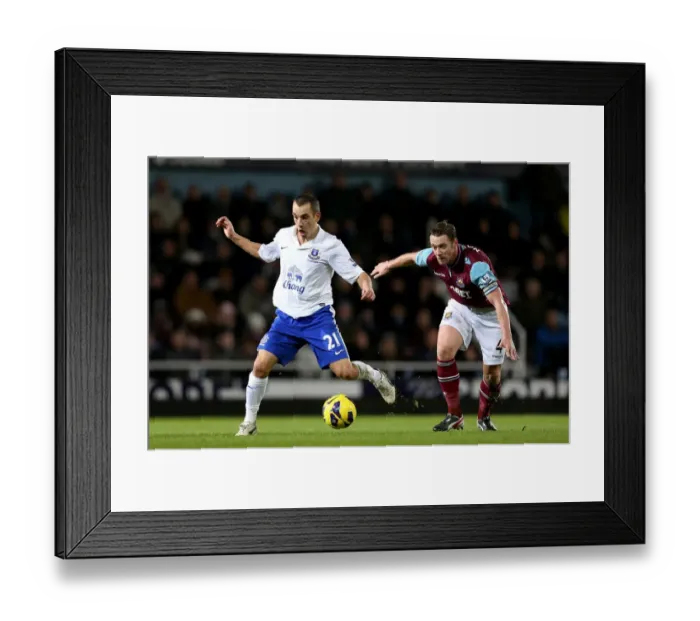 Framed Print : Battle for the Ball: Osman's Triumph over Nolan in Everton's 2-1 Victory (BPL 2012) Framed Print : Battle for the Ball: Osman's Triumph over Nolan in Everton's 2-1 Victory (BPL 2012)