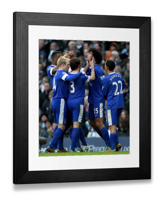 Framed Print : Fellaini's Stunner: Manchester Derby Goal (1-1) - Everton at Etihad Stadium (December 2012) Framed Print : Fellaini's Stunner: Manchester Derby Goal (1-1) - Everton at Etihad Stadium (December 2012)