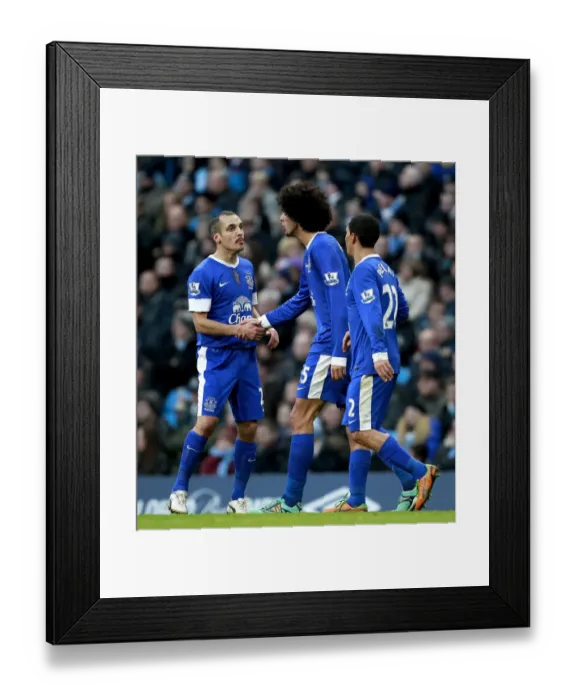 Framed Print : Fellaini's Stunner: Dramatic Equalizer for Everton Against Manchester City (1-1) Framed Print : Fellaini's Stunner: Dramatic Equalizer for Everton Against Manchester City (1-1)