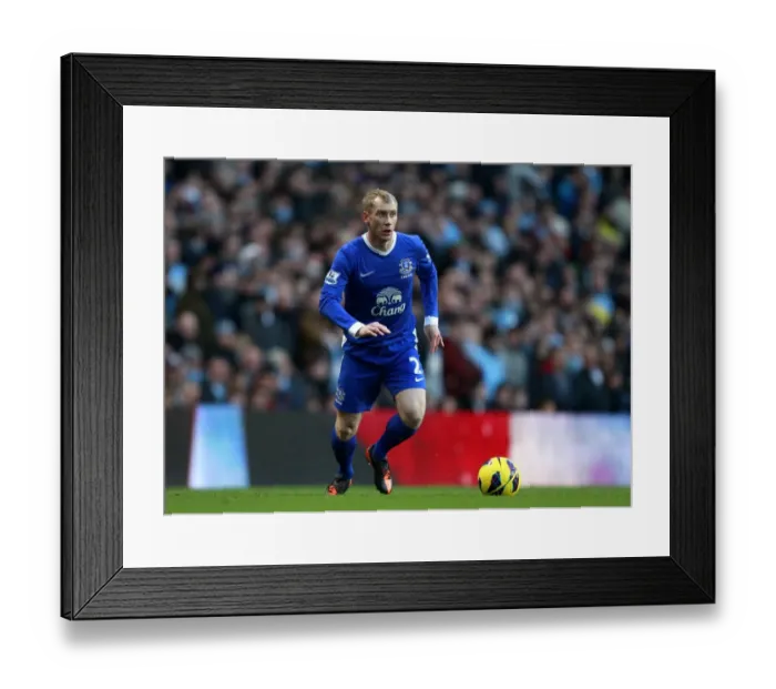 Framed Print : Draw at Etihad: Tony Hibbert Stands Firm for Everton vs. Manchester City (December 1, 2012, Barclays Premier League) Framed Print : Draw at Etihad: Tony Hibbert Stands Firm for Everton vs. Manchester City (December 1, 2012, Barclays Premier League)