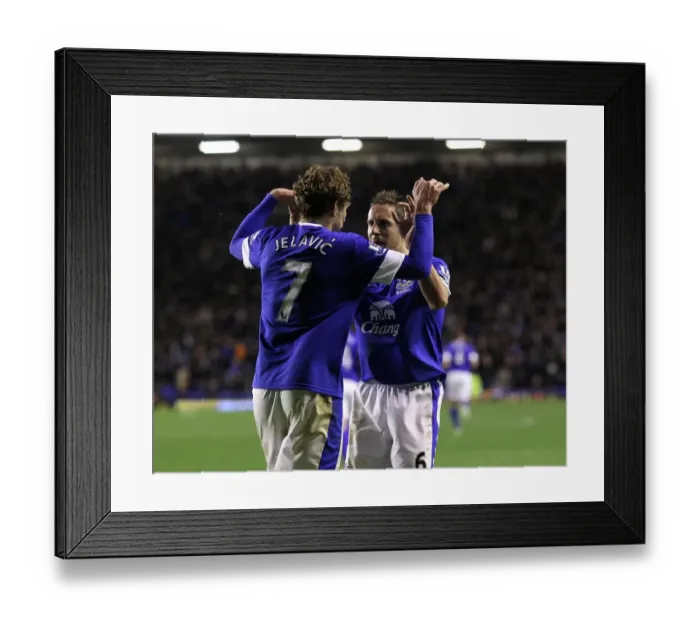 Framed Print : Everton's Jelavic and Jagielka: A Celebratory Moment as Everton Takes a 2-1 Lead Over Tottenham (December 9, 2012, Goodison Park)