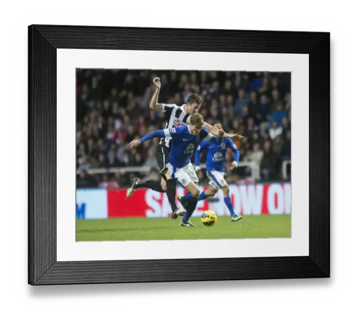Framed Print : Battle for the Ball: Jelavic vs. Williamson - Everton's Victory at St. James Park (Everton 2-1 Newcastle United) Framed Print : Battle for the Ball: Jelavic vs. Williamson - Everton's Victory at St. James Park (Everton 2-1 Newcastle United)