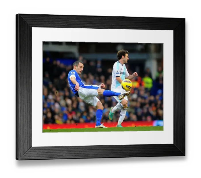 Framed Print : Leon Osman vs Juan Mata: Intense Battle for Ball Possession in Everton vs Chelsea Premier League Clash (December 30, 2012) Framed Print : Leon Osman vs Juan Mata: Intense Battle for Ball Possession in Everton vs Chelsea Premier League Clash (December 30, 2012)