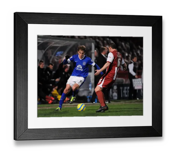 Framed Print : Jelavic vs. Elliott: Everton's Dominance in FA Cup Clash Against Cheltenham Town Framed Print : Jelavic vs. Elliott: Everton's Dominance in FA Cup Clash Against Cheltenham Town