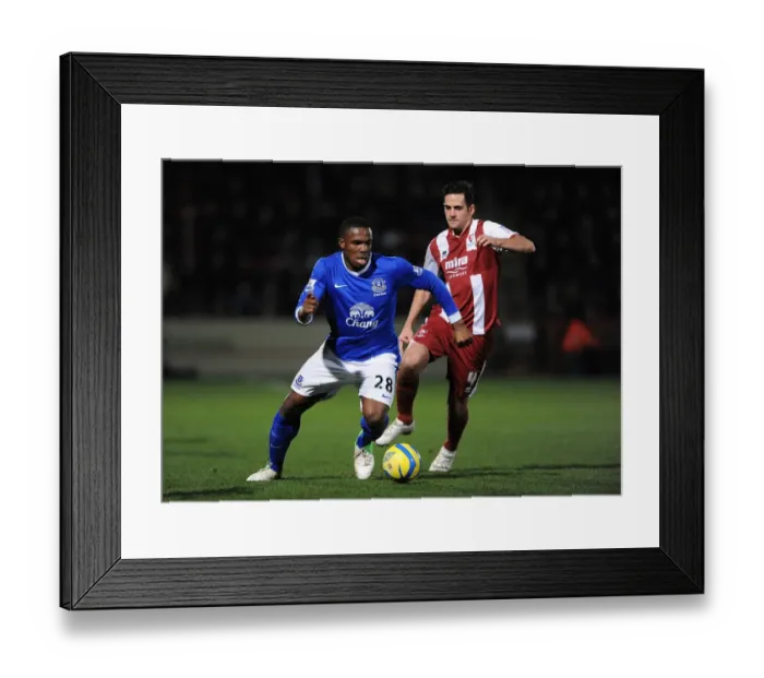 Framed Print : Everton's Anichebe Evades Carter: Everton's Dominance Over Cheltenham Town in FA Cup Third Round (January 7, 2013) Framed Print : Everton's Anichebe Evades Carter: Everton's Dominance Over Cheltenham Town in FA Cup Third Round (January 7, 2013)