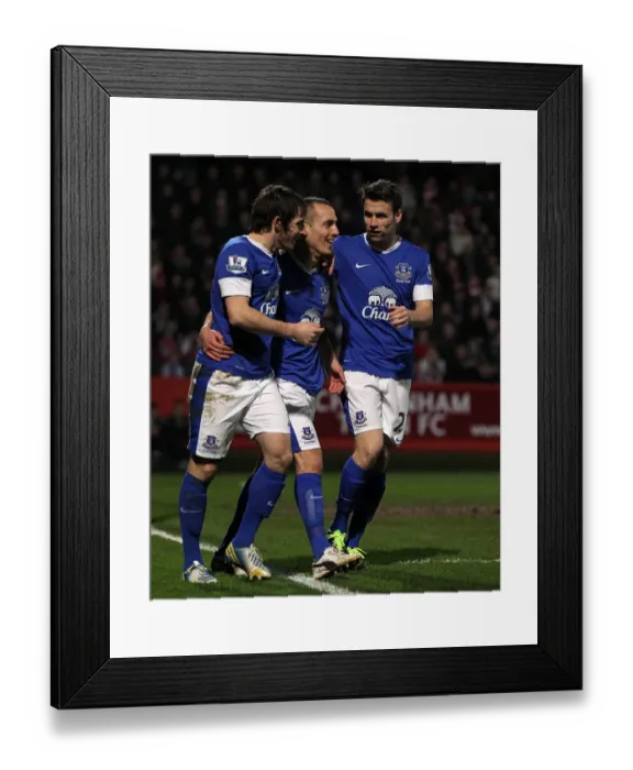 Framed Print : Osman, Baines, and Coleman: Everton's Triumphant Goal Celebration vs. Cheltenham Town (FA Cup, Round 3) Framed Print : Osman, Baines, and Coleman: Everton's Triumphant Goal Celebration vs. Cheltenham Town (FA Cup, Round 3)