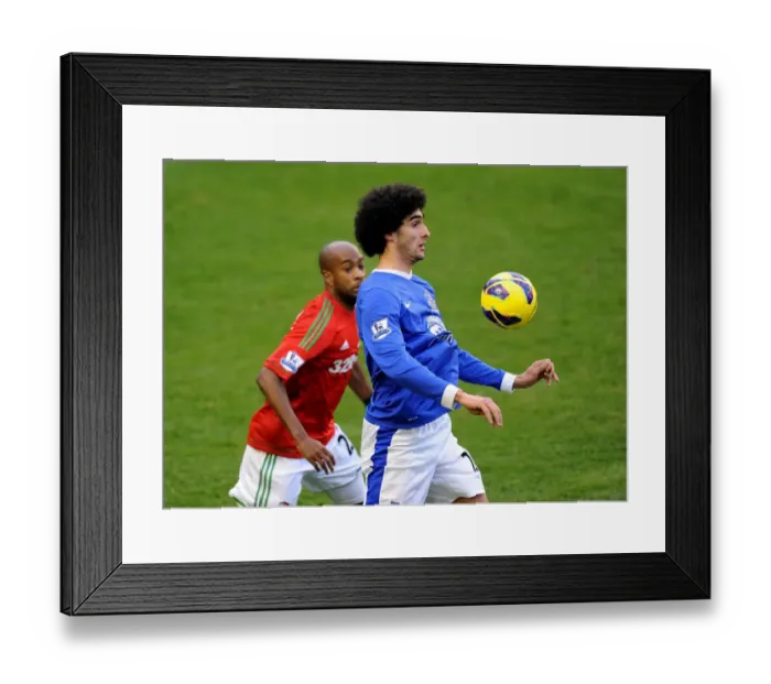 Framed Print : Fellaini vs. Tiendalli: A Battle at Goodison Park - Everton vs. Swansea City, Barclays Premier League (12-01-2013) Framed Print : Fellaini vs. Tiendalli: A Battle at Goodison Park - Everton vs. Swansea City, Barclays Premier League (12-01-2013)