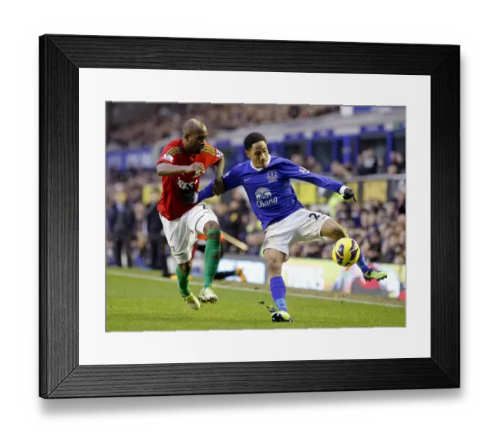 Framed Print : Battle at Goodison Park: A Stalemate Between Tiendalli and Pienaar (Everton vs Swansea City, Barclays Premier League, 12-01-2013) Framed Print : Battle at Goodison Park: A Stalemate Between Tiendalli and Pienaar (Everton vs Swansea City, Barclays Premier League, 12-01-2013)
