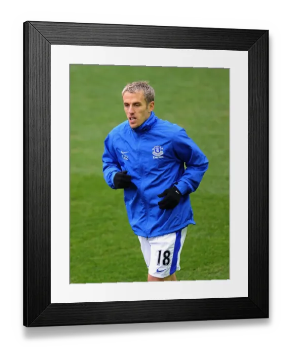 Framed Print : Scoreless Battle at Goodison Park: Everton vs Swansea City (Phil Neville, 12-01-2013) Framed Print : Scoreless Battle at Goodison Park: Everton vs Swansea City (Phil Neville, 12-01-2013)