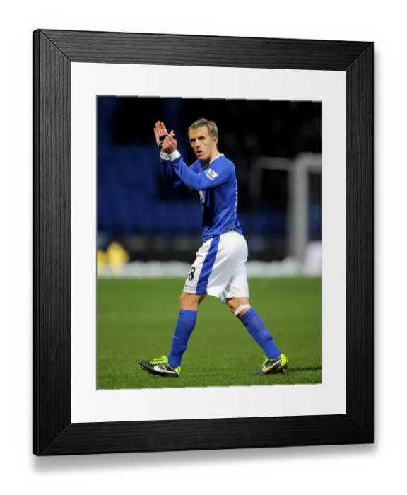 Framed Print : Everton's Phil Neville Celebrates FA Cup Victory Over Bolton Wanderers at Reebok Stadium (January 26, 2013): A Triumphant Applause to the Faithful Fans