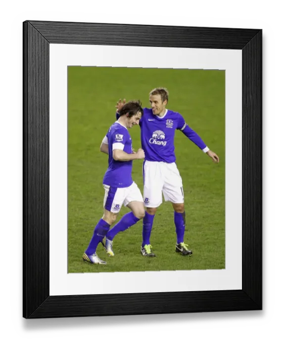 Framed Print : Leighton Baines Scores Penalty and Celebrates with Neville: Everton's Victory over West Bromwich Albion (30-01-2013) Framed Print : Leighton Baines Scores Penalty and Celebrates with Neville: Everton's Victory over West Bromwich Albion (30-01-2013)