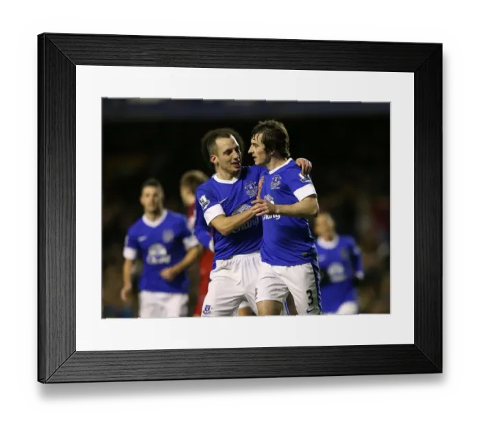 Framed Print : Leighton Baines Scores Penalty, Celebrates with Leon Osman: Everton's 2-1 Win over West Bromwich Albion (30-01-2013) Framed Print : Leighton Baines Scores Penalty, Celebrates with Leon Osman: Everton's 2-1 Win over West Bromwich Albion (30-01-2013)