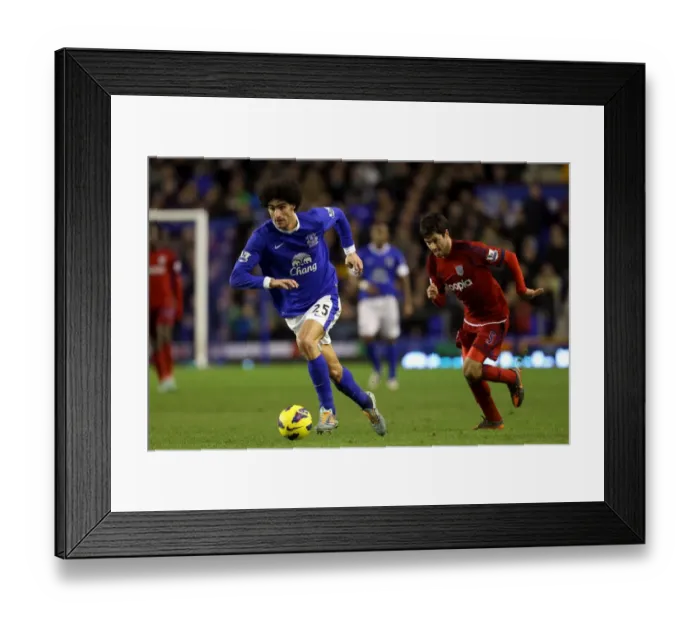 Framed Print : Intense Battle for Ball Possession: Fellaini vs. Yacob - Everton vs. West Bromwich Albion, Premier League (Everton 2-1) Framed Print : Intense Battle for Ball Possession: Fellaini vs. Yacob - Everton vs. West Bromwich Albion, Premier League (Everton 2-1)