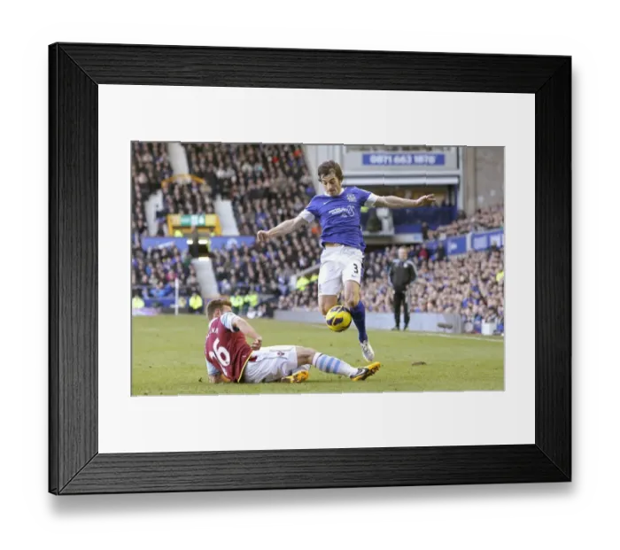 Framed Print : Battle at Goodison Park: Everton vs. Aston Villa - A Thrilling Draw as Leighton Baines and Andreas Weimann Clash (Barclays Premier League) Framed Print : Battle at Goodison Park: Everton vs. Aston Villa - A Thrilling Draw as Leighton Baines and Andreas Weimann Clash (Barclays Premier League)