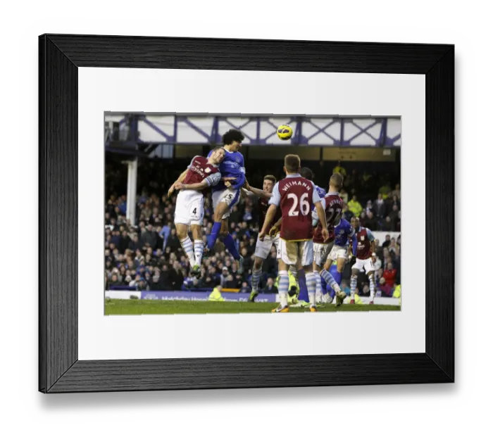 Framed Print : Dramatic Header: Marouane Fellaini Scores Late Equalizer for Everton against Aston Villa (02-02-2013, Goodison Park) Framed Print : Dramatic Header: Marouane Fellaini Scores Late Equalizer for Everton against Aston Villa (02-02-2013, Goodison Park)