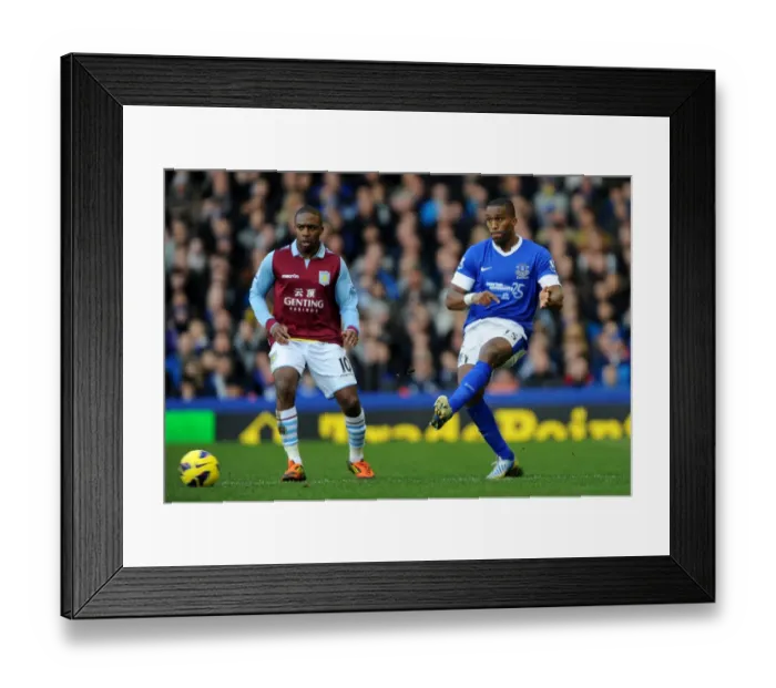 Framed Print : Distin vs. Zogbia: Thrilling 3-3 Draw at Goodison Park - Everton vs. Aston Villa, Barclays Premier League (02-02-2013)