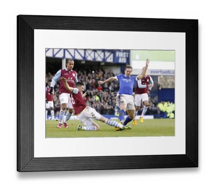 Framed Print : Clash at Goodison Park: Jagielka vs. Clark - Ever-vs-Villa's Thrilling 3-3 Battle Framed Print : Clash at Goodison Park: Jagielka vs. Clark - Ever-vs-Villa's Thrilling 3-3 Battle