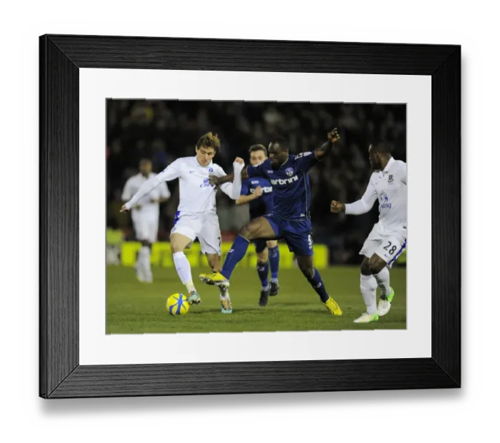 Framed Print : Jelavic vs. Mvoto: Intense Clash in FA Cup Fifth Round between Oldham Athletic and Everton Framed Print : Jelavic vs. Mvoto: Intense Clash in FA Cup Fifth Round between Oldham Athletic and Everton