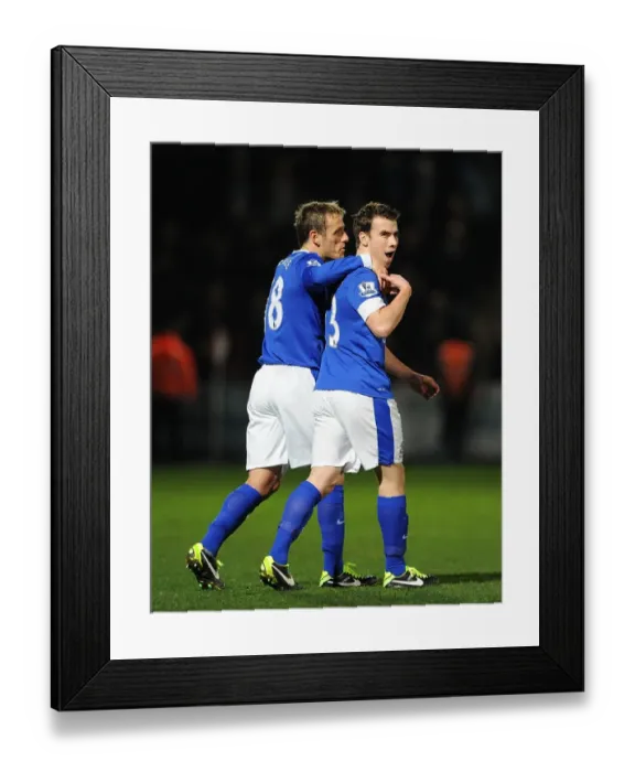 Framed Print : Everton's Coleman and Neville: United in Victory - FA Cup Third Round Goal Celebration vs Cheltenham Town (7-1-2013) Framed Print : Everton's Coleman and Neville: United in Victory - FA Cup Third Round Goal Celebration vs Cheltenham Town (7-1-2013)