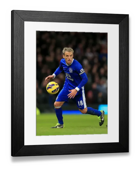 Framed Print : Phil Neville's Emotional Homecoming: Everton's 2-0 Victory over Manchester United (Old Trafford, 2013) Framed Print : Phil Neville's Emotional Homecoming: Everton's 2-0 Victory over Manchester United (Old Trafford, 2013)