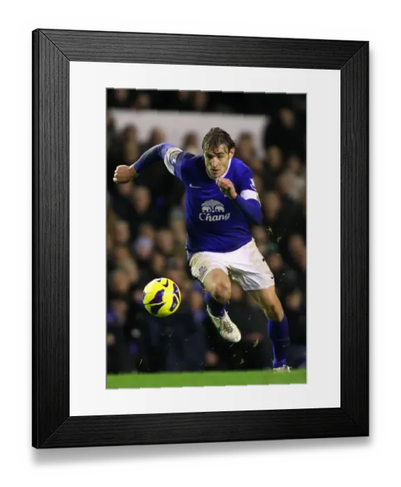 Framed Print : Jelavic's Strike: Everton's Triumph Over Wigan Athletic in the Barclays Premier League (December 26, 2012, Goodison Park) Framed Print : Jelavic's Strike: Everton's Triumph Over Wigan Athletic in the Barclays Premier League (December 26, 2012, Goodison Park)