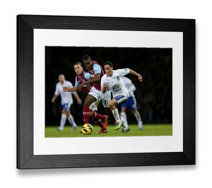 Framed Print : Battling for the Ball: Maiga vs. Pienaar in the Intense West Ham vs. Everton Premier League Clash (Upton Park, 22-12-2012)