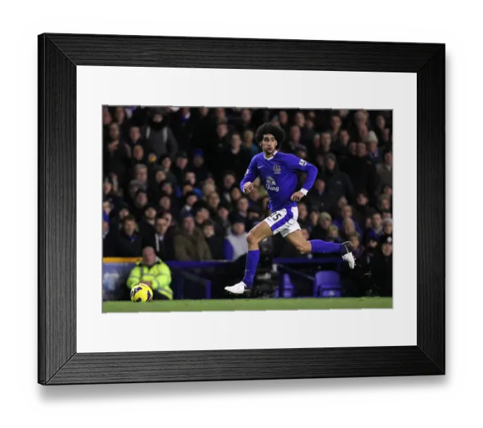 Framed Print : Determined Marouane Fellaini: Everton's Unyielding Performance Against Arsenal in the 1-1 Barclays Premier League Stalemate at Goodison Park (November 28, 2012) Framed Print : Determined Marouane Fellaini: Everton's Unyielding Performance Against Arsenal in the 1-1 Barclays Premier League Stalemate at Goodison Park (November 28, 2012)