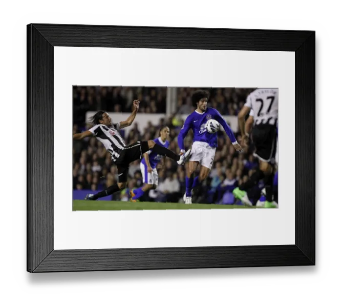 Framed Print : Fellaini Overcomes Gutierrez: Everton vs. Newcastle United, Barclays Premier League, September 17, 2012 Framed Print : Fellaini Overcomes Gutierrez: Everton vs. Newcastle United, Barclays Premier League, September 17, 2012