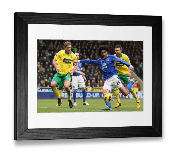 Framed Print : Fellaini's Determined Shot: Norwich City vs. Everton, Premier League (Feb 2013)