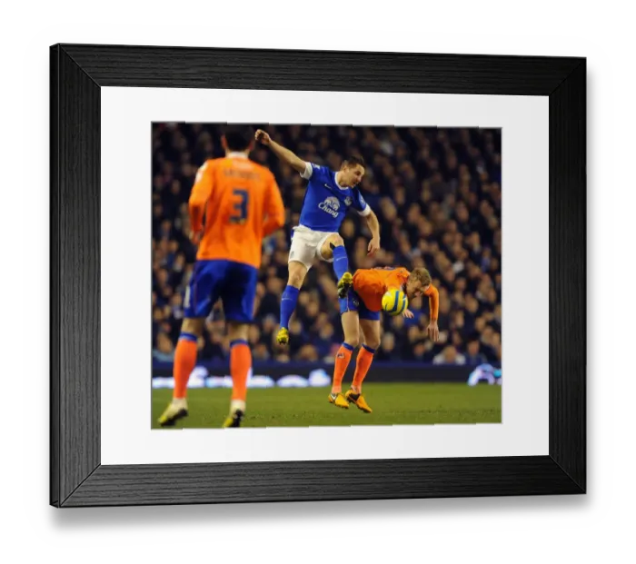 Framed Print : Phil Jagielka vs. Dean Furman: FA Cup Battle at Goodison Park