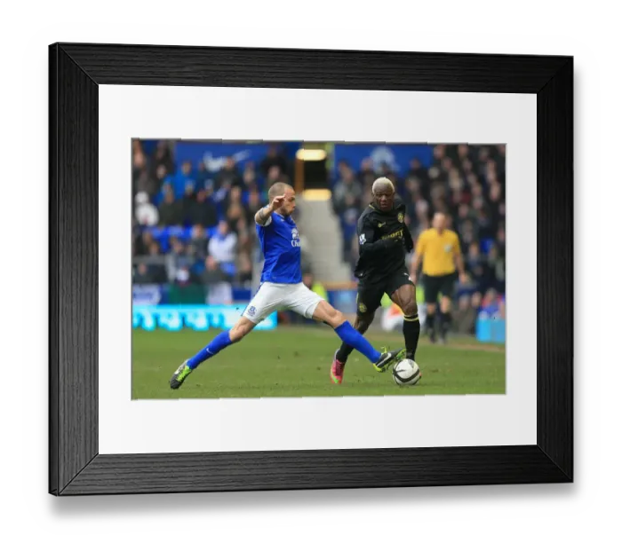 Framed Print : Battling for FA Cup Supremacy: Heitinga vs. Kone (Everton vs. Wigan Athletic, 2013 Quarter-Finals) Framed Print : Battling for FA Cup Supremacy: Heitinga vs. Kone (Everton vs. Wigan Athletic, 2013 Quarter-Finals)