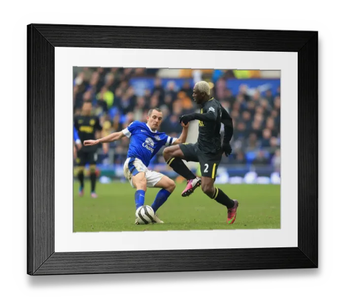 Framed Print : Osman vs. Kone: Wigan Athletic Stuns Everton in FA Cup Quarterfinals at Goodison Park (3-0)