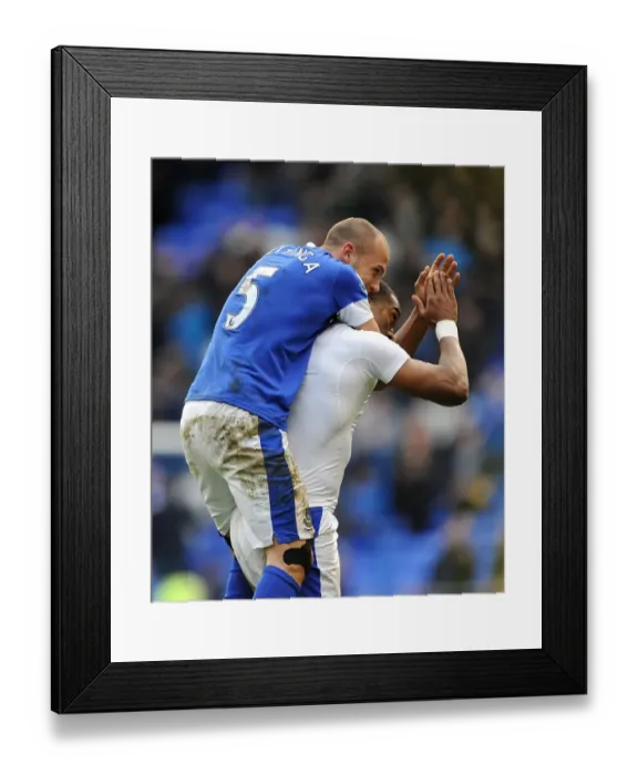 Framed Print : Everton's Heitinga and Distin: Celebrating Victory Over Manchester City at Goodison Park (16-03-2013) Framed Print : Everton's Heitinga and Distin: Celebrating Victory Over Manchester City at Goodison Park (16-03-2013)