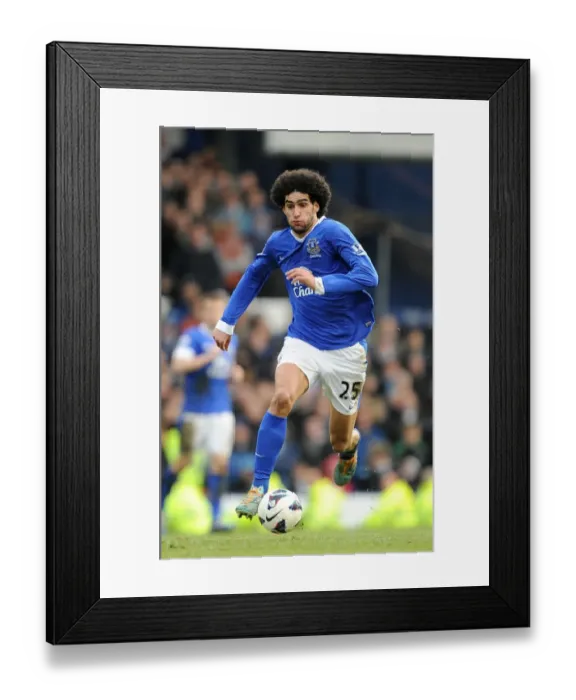 Framed Print : Everton's Marouane Fellaini Shines: Everton 2 - Manchester City 0 (Premier League, Goodison Park, 16-03-2013) Framed Print : Everton's Marouane Fellaini Shines: Everton 2 - Manchester City 0 (Premier League, Goodison Park, 16-03-2013)