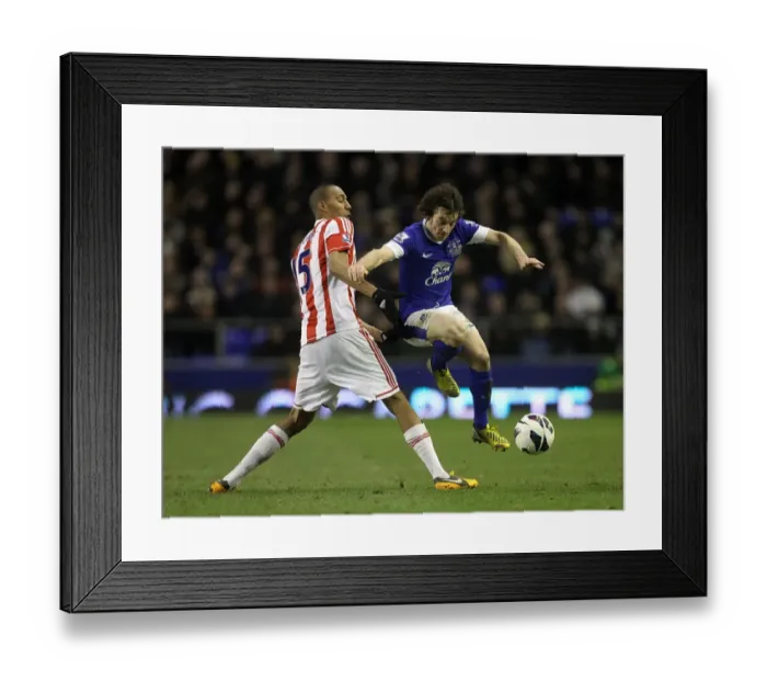 Framed Print : Intense Rivalry: Leighton Baines vs. Steven Nzonzi - Everton's Hard-Fought Victory over Stoke City (Goodison Park, 30-03-2013) Framed Print : Intense Rivalry: Leighton Baines vs. Steven Nzonzi - Everton's Hard-Fought Victory over Stoke City (Goodison Park, 30-03-2013)
