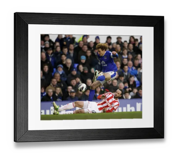 Framed Print : Marc Wilson's Controversial Slide Tackle on Nikica Jelavic: Everton vs Stoke City (30-03-2013) Framed Print : Marc Wilson's Controversial Slide Tackle on Nikica Jelavic: Everton vs Stoke City (30-03-2013)