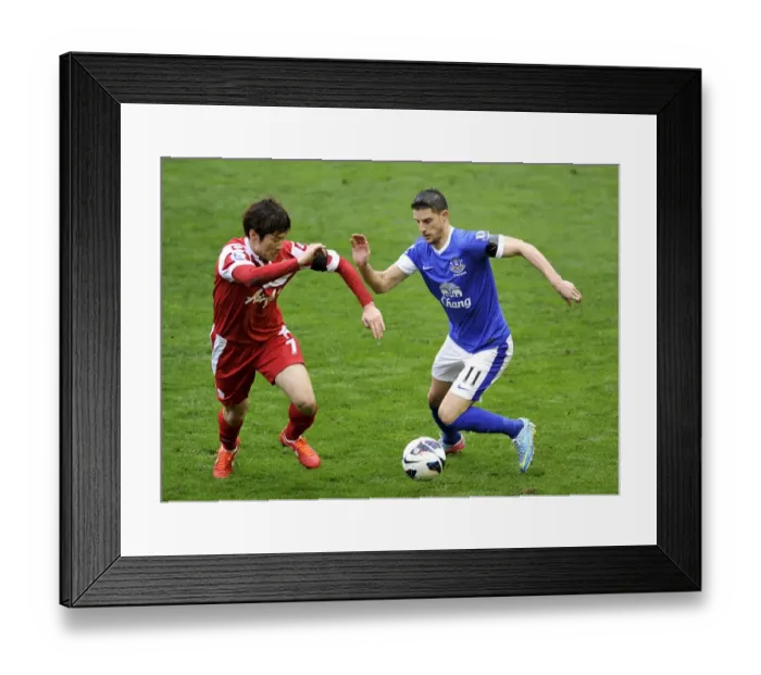 Framed Print : Battle at Goodison Park: Mirallas vs. Park Ji-Sung Framed Print : Battle at Goodison Park: Mirallas vs. Park Ji-Sung