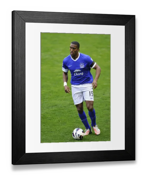 Framed Print : Everton's Triumph over Queens Park Rangers: Distin's Dominance (13-04-2013) Framed Print : Everton's Triumph over Queens Park Rangers: Distin's Dominance (13-04-2013)