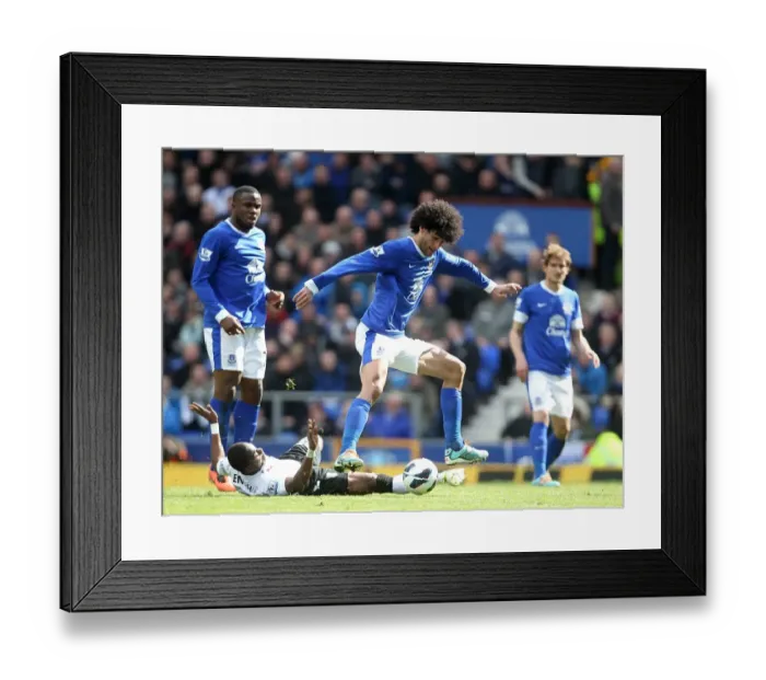 Framed Print : Intense Rivalry: Fellaini vs. Enoh at Goodison Park - Everton's Narrow 1-0 Victory over Fulham Framed Print : Intense Rivalry: Fellaini vs. Enoh at Goodison Park - Everton's Narrow 1-0 Victory over Fulham