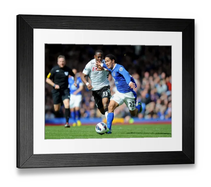 Framed Print : Steven Pienaar vs Eyong Enoh: A Battle for Ball Supremacy (Everton 1-0 Fulham, Goodison Park, Barclays Premier League, 2013) Framed Print : Steven Pienaar vs Eyong Enoh: A Battle for Ball Supremacy (Everton 1-0 Fulham, Goodison Park, Barclays Premier League, 2013)