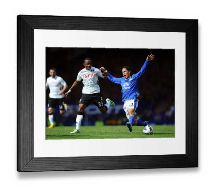 Framed Print : Steven Pienaar vs Eyong Enoh: A Battle for Supremacy at Goodison Park (Everton 1-0) Framed Print : Steven Pienaar vs Eyong Enoh: A Battle for Supremacy at Goodison Park (Everton 1-0)
