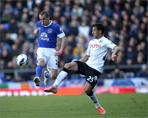 Battle for the Ball: Osman vs. Manolev - Everton's Supremacy over Fulham (1-0)